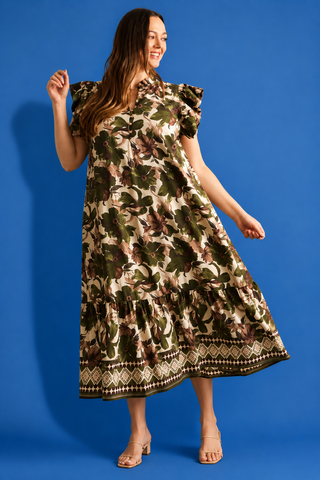  a tiered midi dress with a dark green and brown floral print on a beige background, featuring ruffled cap sleeves 