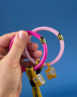 With its glossy pink finish and signature crystal-accented BuDhaGirl bead