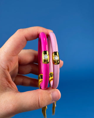 With its glossy pink finish and signature crystal-accented BuDhaGirl bead