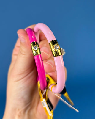 With its glossy pink finish and signature crystal-accented BuDhaGirl bead