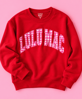 red crewneck sweatshirt with 'LULU MAC' in white arched letters