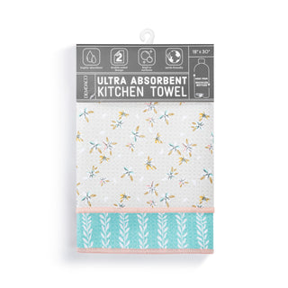 Packaged kitchen towel with floral and leaf patterns on a white background
