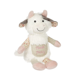 Plush cow toy with 'Tooth Fairy' pocket on a white background
