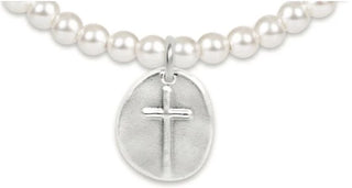 Shop the Classic Pearl 4mm Bracelet - Inspire Sterling Disc featuring elegant white pearls and a sterling silver cross charm. A meaningful gift of faith.