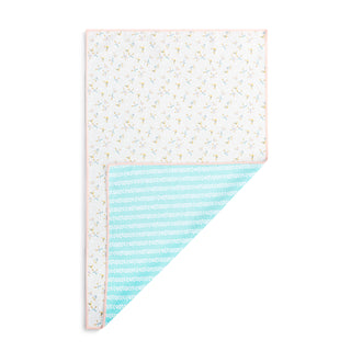  white floral pattern on one side and blue striped pattern on the other, on a white background.