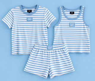 A matching baby loungewear set featuring a short-sleeve t-shirt, a sleeveless tank top, and shorts, all in a light blue and white horizontal stripe pattern with a small 'LULU MAC' logo patch on the chest, displayed on a solid light blue background.