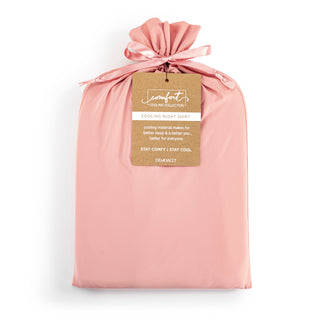 Pink cooling night shirt in a drawstring bag with a label on a white background