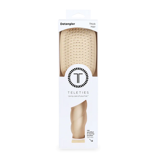 Teleties detangler for thick hair packaging on a white background