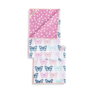 Set of three fabric swatches with butterfly and polka dot patterns on a white background