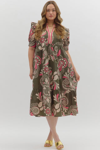 Woman wearing a floral dress on a white background