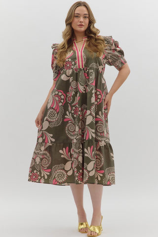 Woman wearing a floral dress on a white background