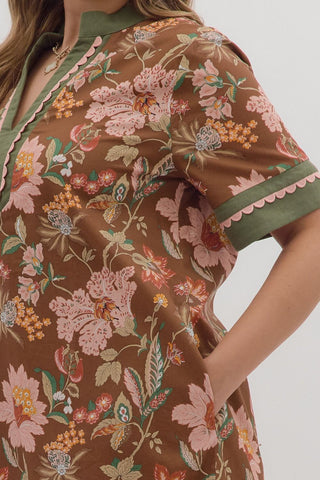 Floral patterned dress with a brown background