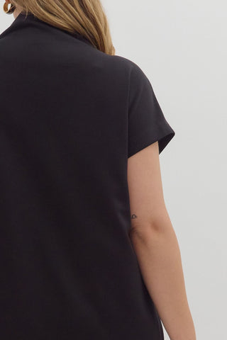 Person wearing a black short-sleeve shirt on a white background