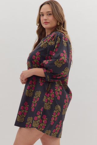 Woman wearing a floral dress on a white background