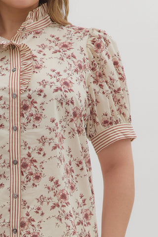 Floral patterned shirt with pink flowers on a white background