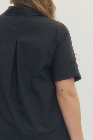 Person wearing a black shirt on a white background