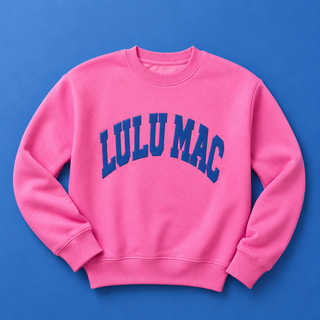 Pink sweatshirt with 'LULU MAC' text on a blue background
