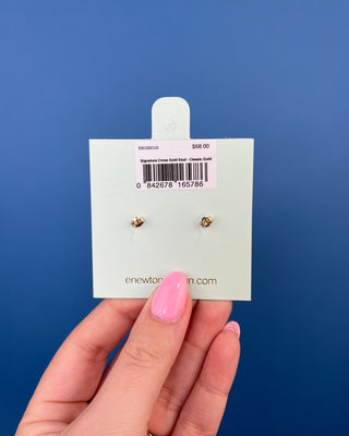 eNewton Signature Cross Gold Stud Earrings in classic gold featuring a polished gold ball with a cross accent and secure post backs, lightweight faith-inspired earrings displayed on an eNewton jewelry card.