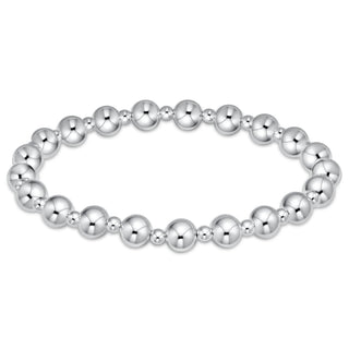 Shop the Grateful Sterling 6mm Bracelet featuring polished sterling silver beads and delicate spacers. Perfect for stacking, everyday wear, and gifting.
