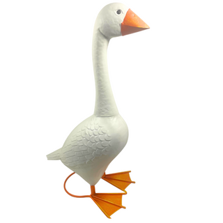 White goose-shaped toy with orange feet and beak on a white background