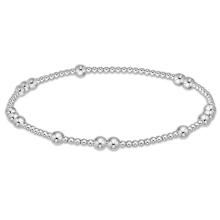 Shop the Hope Unwritten Sterling 4mm Bracelet featuring polished silver beads in varying sizes. A timeless, stackable accessory for everyday elegance.