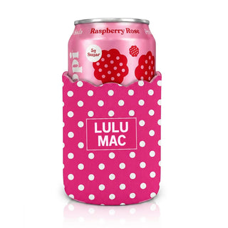 Pink can cooler with white polka dots holding a raspberry rose soda can on a white background