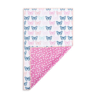  butterfly pattern on one side and pink polka dot pattern on the other, folded on a white background.