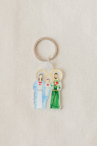 Keychain with family figures on a beige background