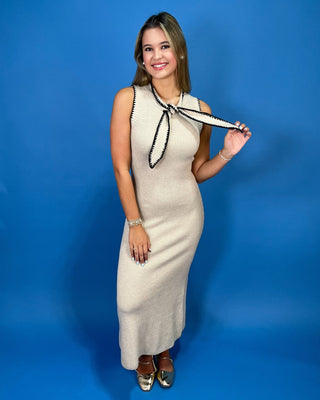 eek ribbed knit silhouette, this elevated maxi dress features a chic sleeveless design and a removable contrast neck tie