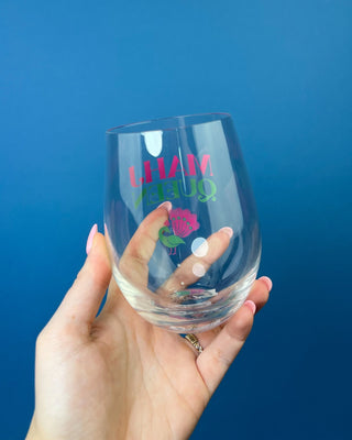 Mahj Queen stemless wine glass with vibrant pink and green lettering and a colorful peacock design on clear glass, perfect fo