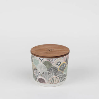 Decorative container with a wooden lid on a white background