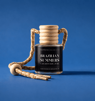 A car diffuser bottle with a black label reading 'BRAZILIAN SUMMERS' and 'MAYWICKS | FRAGRANCE