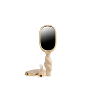 Beige handheld mirror with a black reflective surface on a white background