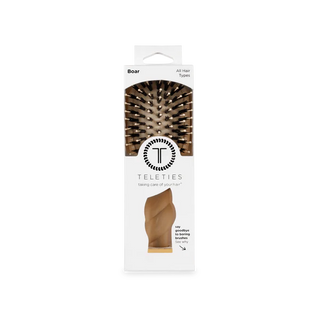 Teleties hairbrush packaging on a white background
