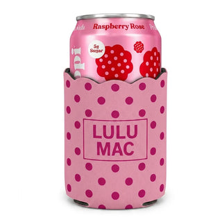 Pink can cooler with polka dots holding a pink raspberry rose soda can on a white background