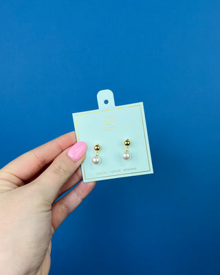eNewton Classic 8mm Ball Drop Stud Pearl Earrings in classic gold featuring polished 8mm gold ball studs with elegant pearl drop accents and secure post backs displayed on an eNewton jewelry card.