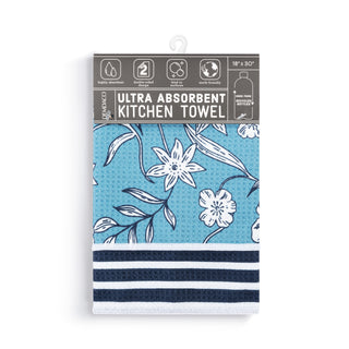 Packaged kitchen towel with floral design and text on a white background