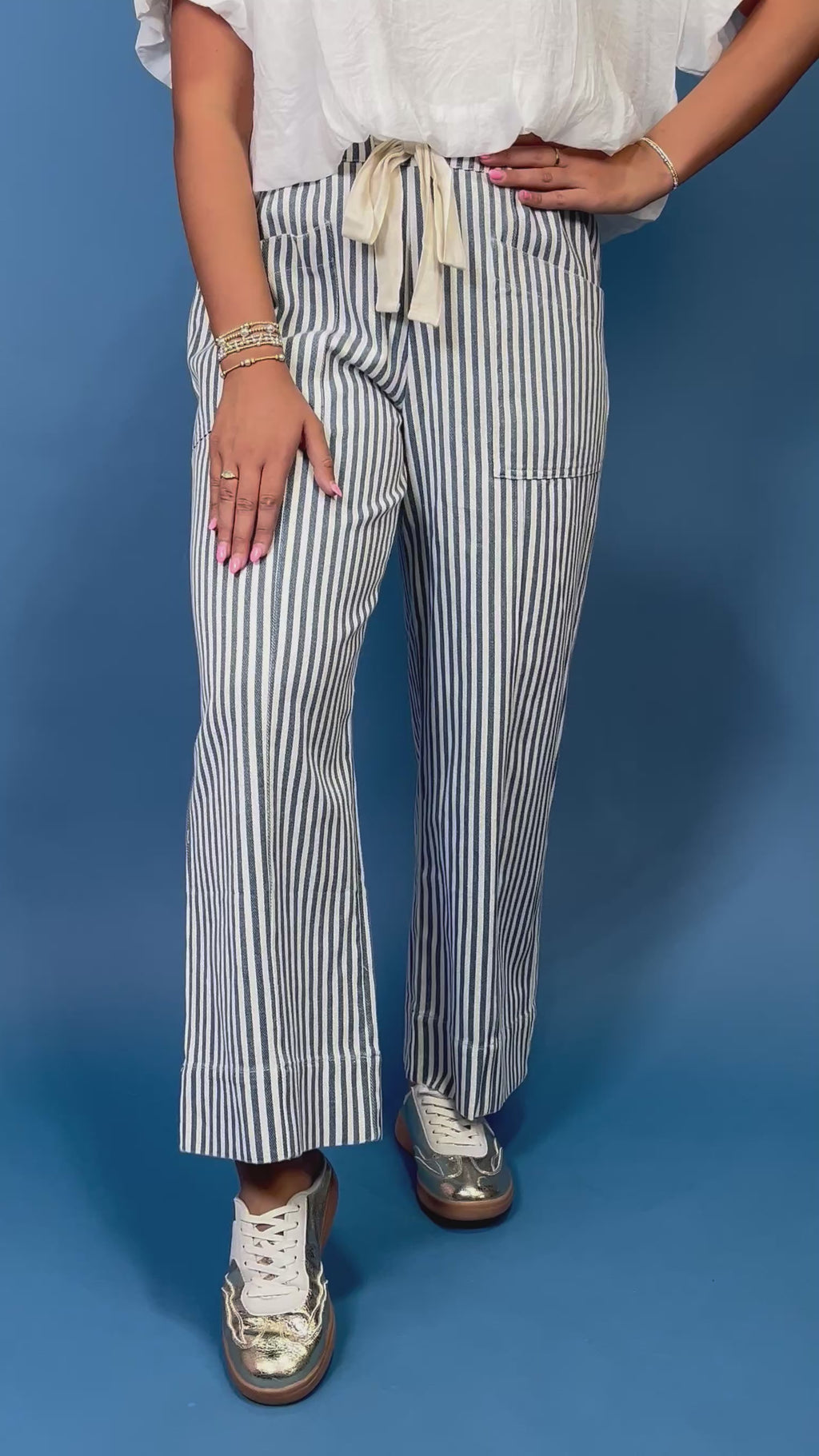 Blue & Ivory Wide Leg Stripe Pants, blue stripe pattern, elastic drawstring waist, and a wide leg fit.