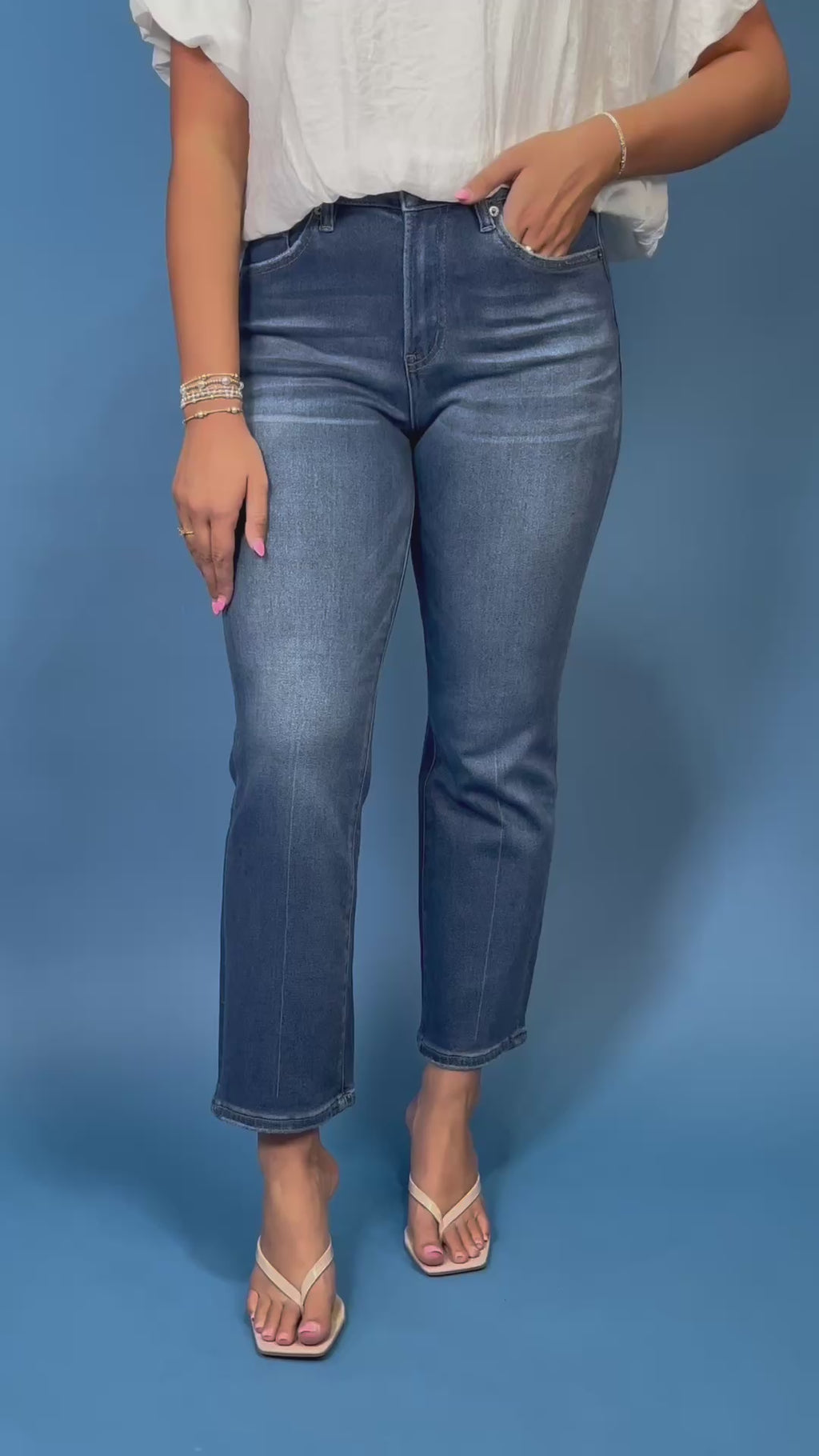 HR Dark Wash Straight Ankle Jeans featuring a flattering high-rise fit, straight ankle leg