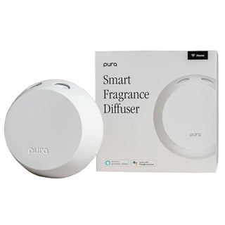 Pura smart fragrance diffuser with packaging on a white background