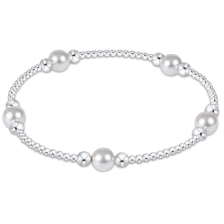 Shop the Purpose Pearl 6mm Sterling Bracelet featuring polished sterling silver beads and elegant white pearl accents. Perfect for everyday wear or gifting.