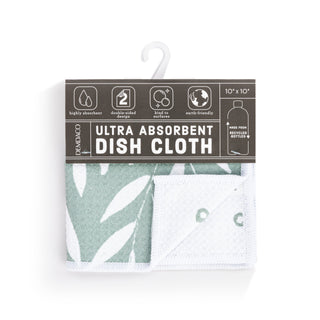 Packaged ultra-absorbent dish cloth with green leaf pattern on a white background