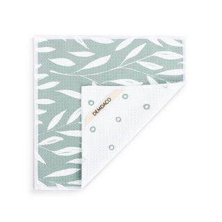 Two greeting cards with leaf patterns on a white background