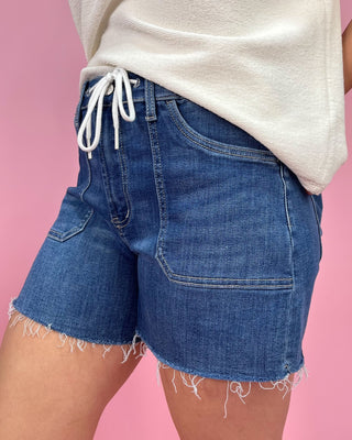 The Jenna HR Drawstring Raw Hem Denim Shorts - All About You