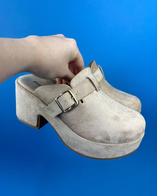 Shop the Nude Suede Closed Toe Platform Heel featuring soft faux suede, a platform sole, adjustable buckle, and a