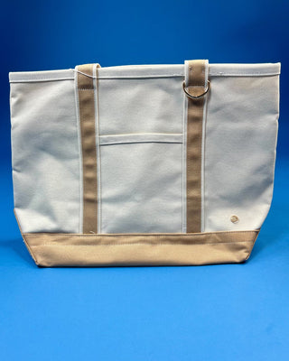 Large heavyweight canvas tote bag with contrast trim, reinforced shoulder straps, exterior slip pocket, and spacious