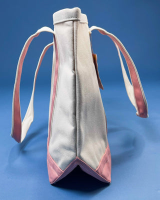 Large heavyweight canvas tote bag with contrast trim, reinforced shoulder straps, exterior slip pocket, and spacious