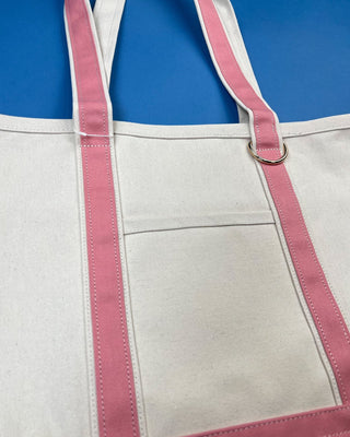 Large heavyweight canvas tote bag with contrast trim, reinforced shoulder straps, exterior slip pocket, and spacious interi
