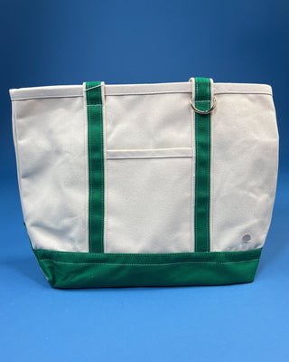 Large heavyweight canvas tote bag with contrast trim, reinforced shoulder straps, exterior slip pocket, and spacious