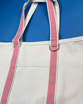 Large heavyweight canvas tote bag with contrast trim, reinforced shoulder straps, exterior slip pocket, and spacious interi